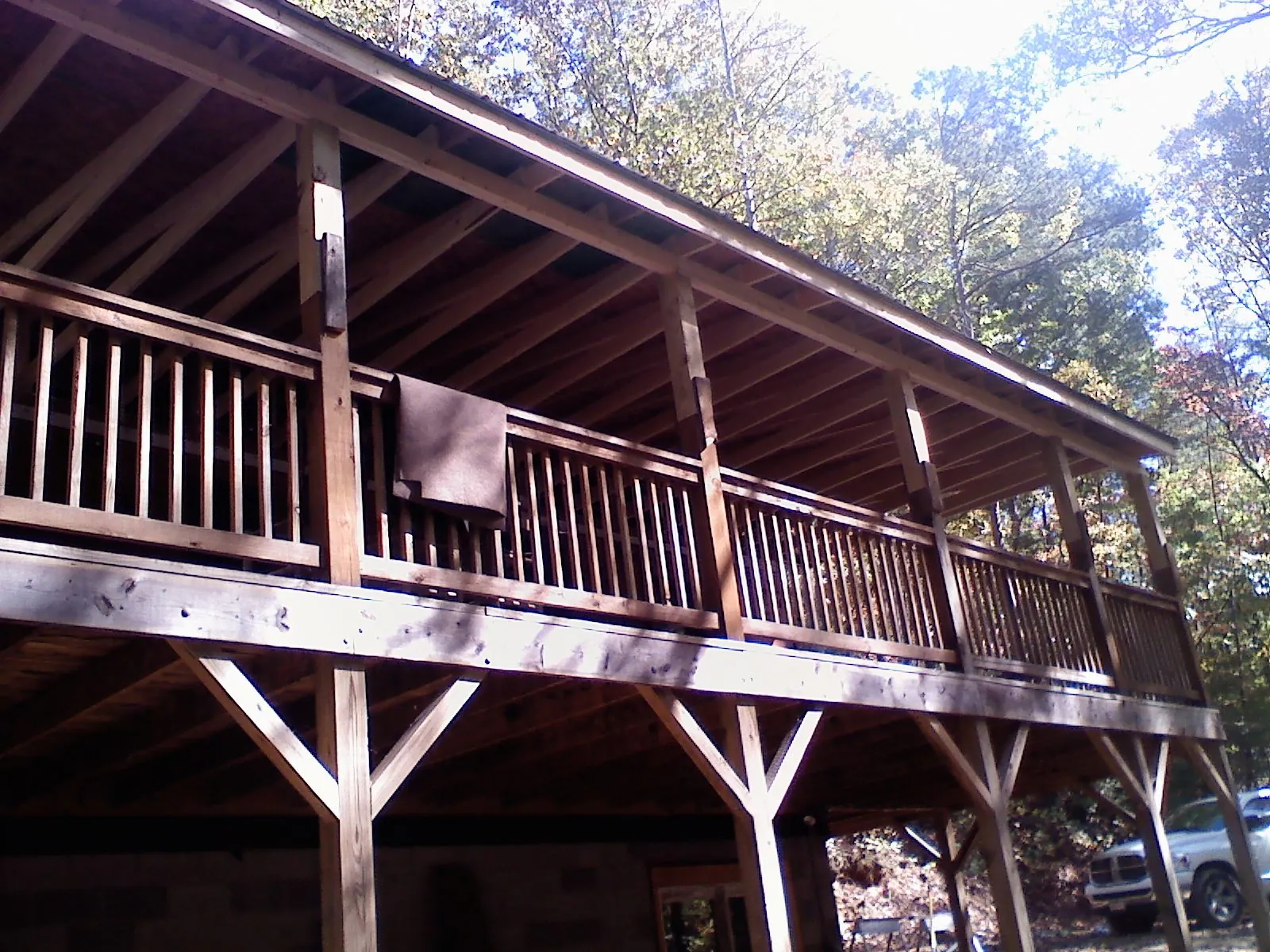 Timber framing under a new elevated porch and deck — Roof Leak Repair in Barry by Roofing Brothers